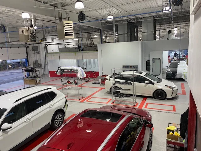 Complete Auto Body Speers Road active workshop floor in Oakville